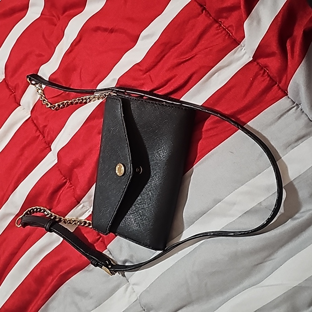Small wallet purse with gold detail.